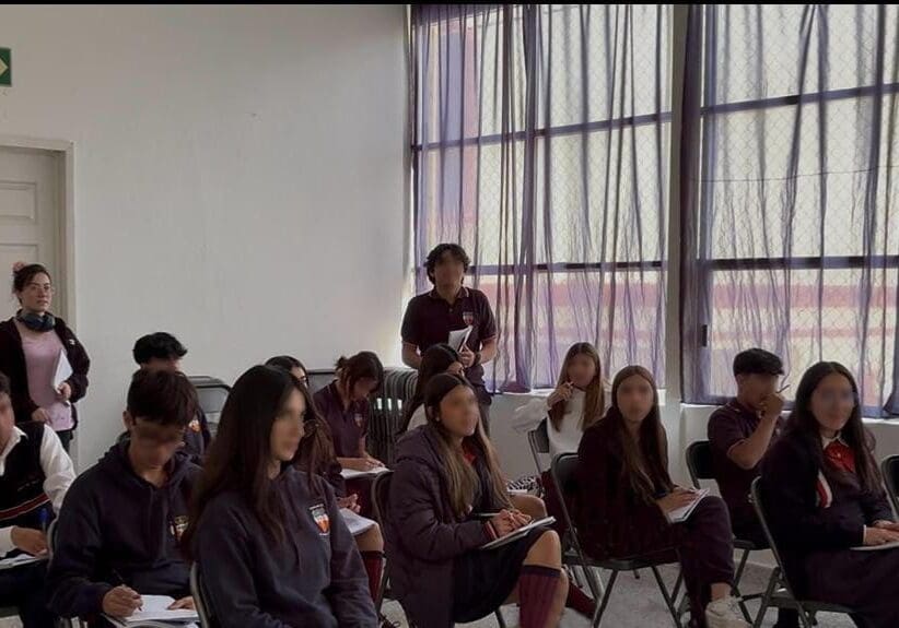 Students seated in a classroom during lecture.